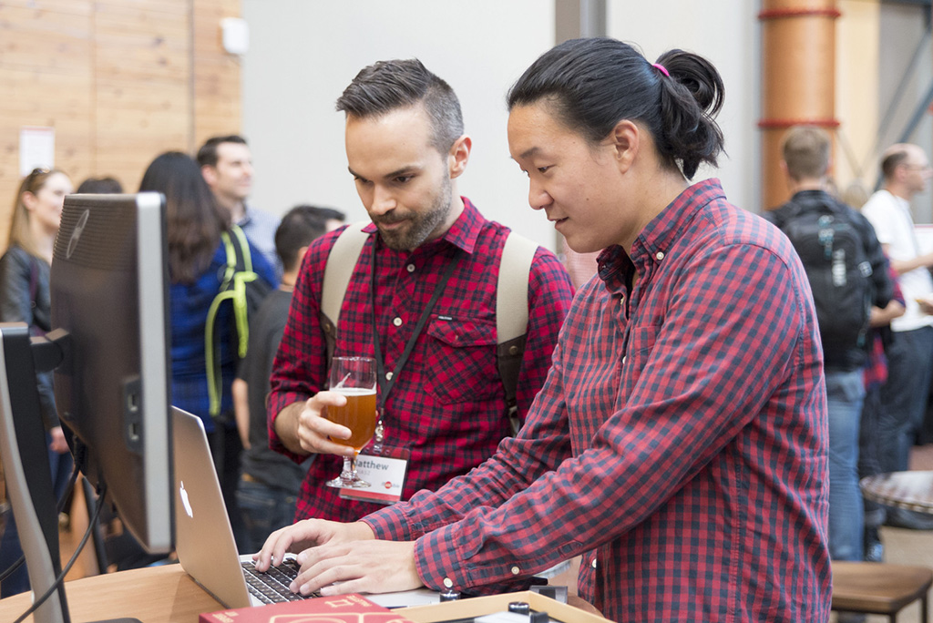 two people looking at a computer screen